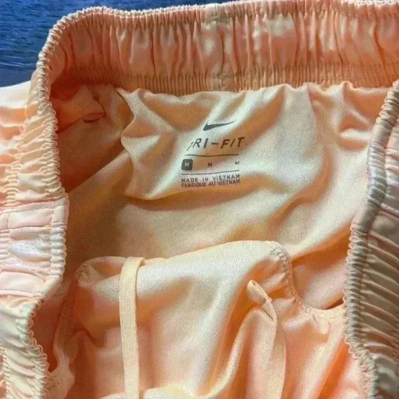 Nike Dri-Fit Shorts.  Women’s size medium. Very cute yellow color! - Picture 3 of 5